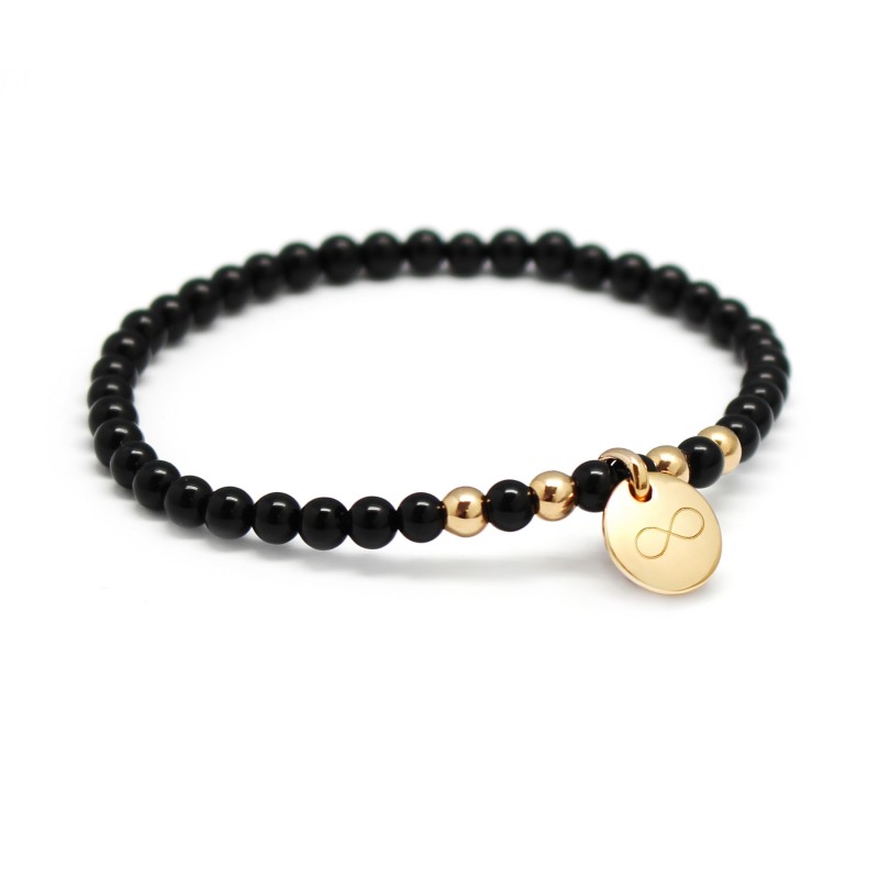Gold-plated charm necklace and black beads